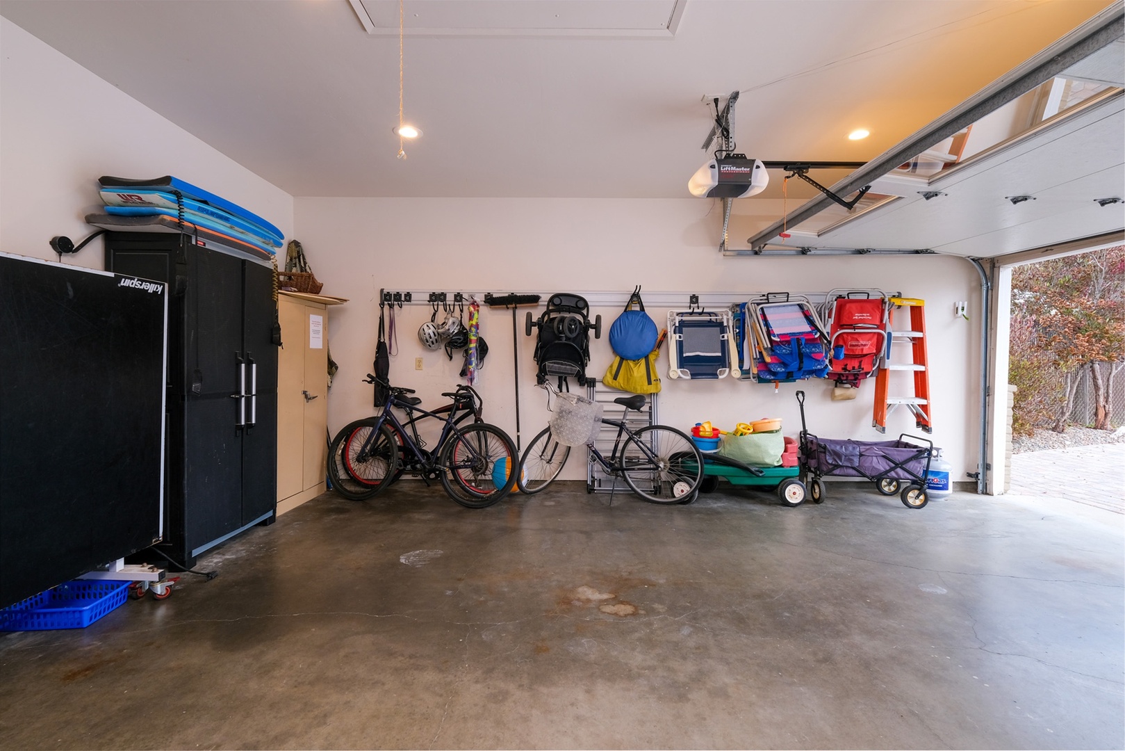 The ping pong table is in the garage adjacent to the den. Guests can park in the garage or driveway of the home.