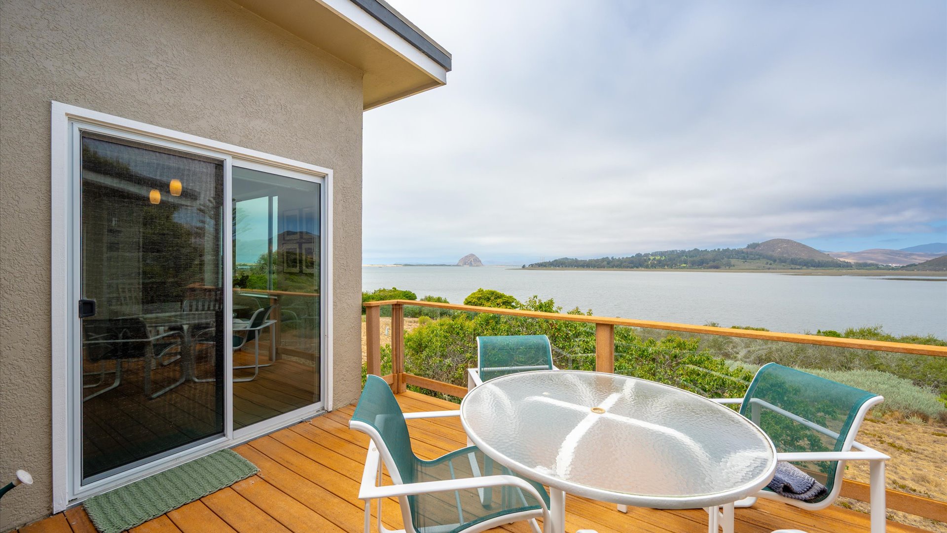 The deck with BBQ grill and patio table, perfect for alfreco dining and watching the sunset