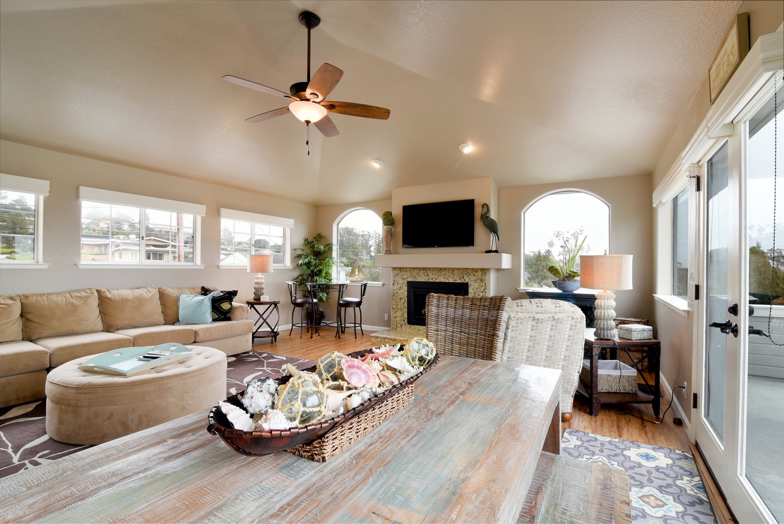 You can dine inside at this table that will seat 6 to 8 people or dine outside on the adjacent deck.