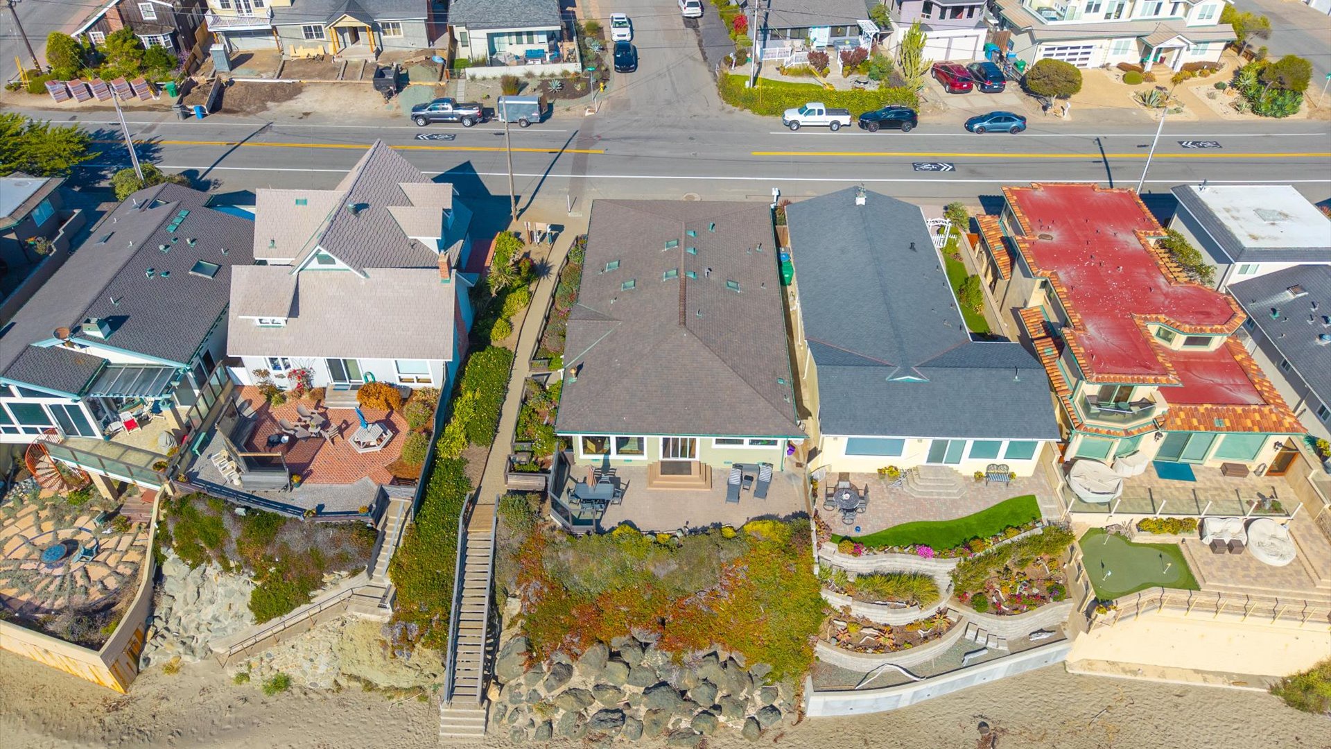 Steps to the sand right outside the front door, elevated oceanfront patio, this home has it all