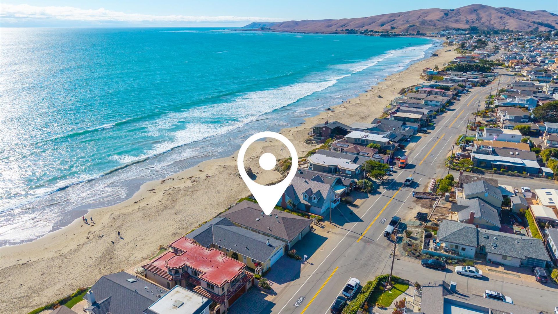 Endless sand and ocean in both directions from this Cayucos Oceanfront home