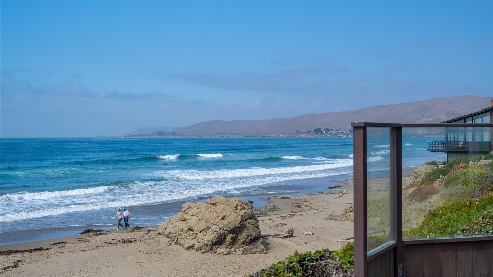 Views in all directions, steps from the sand and surf