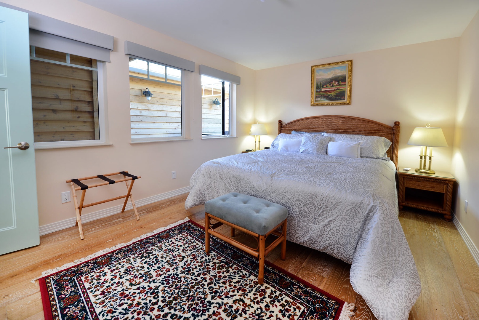 The bedroom has a king bed and TV. Enjoy the luxurious bedding