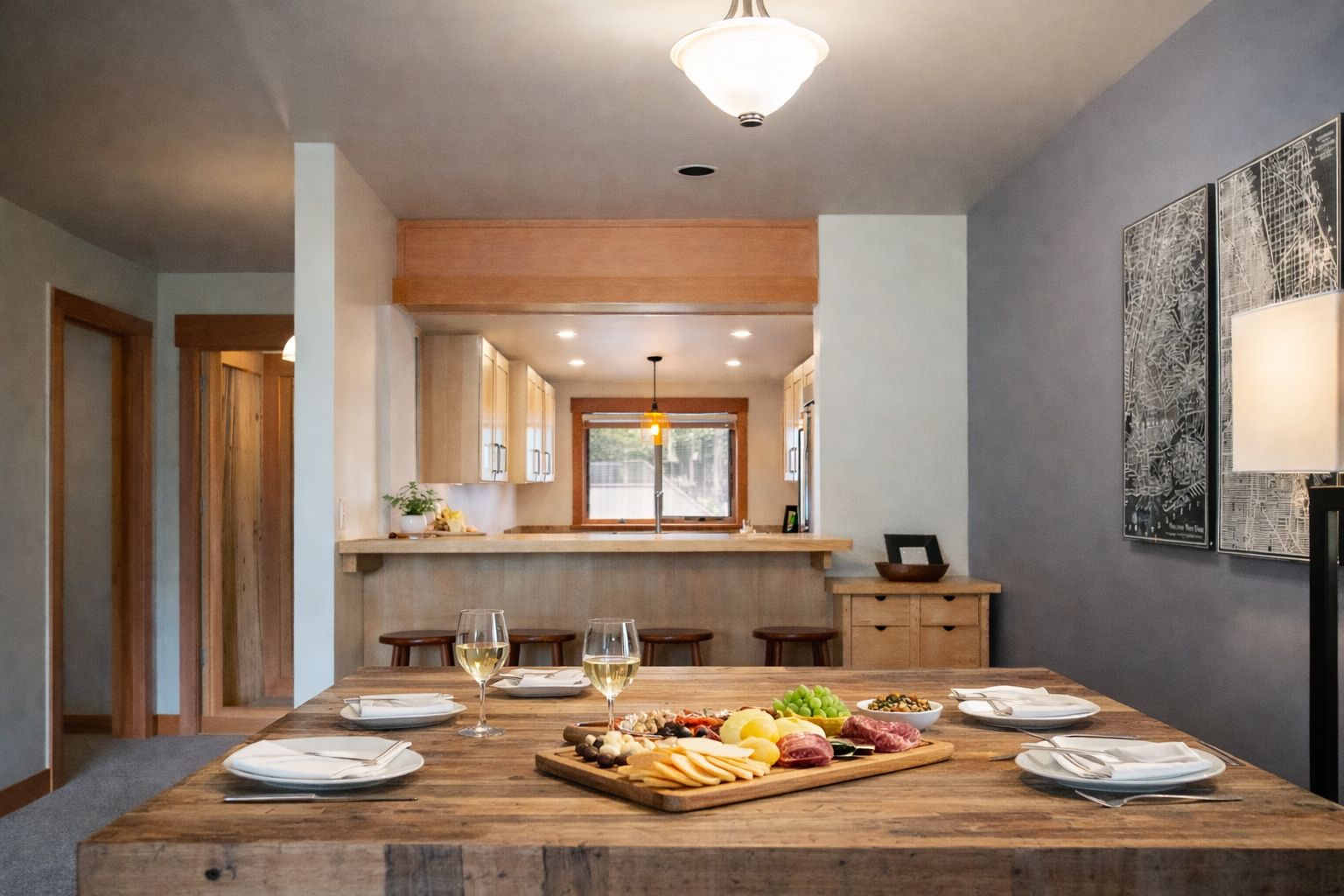 Gather around your spacious dining table where shared meals become cherished memories, with a fully equipped kitchen ready for your culinary adventures.