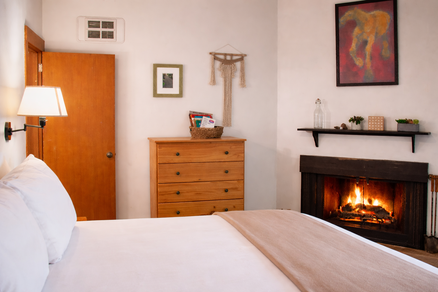 Drift off to sleep beside your crackling fireplace, where warmth and comfort create the perfect evening retreat.