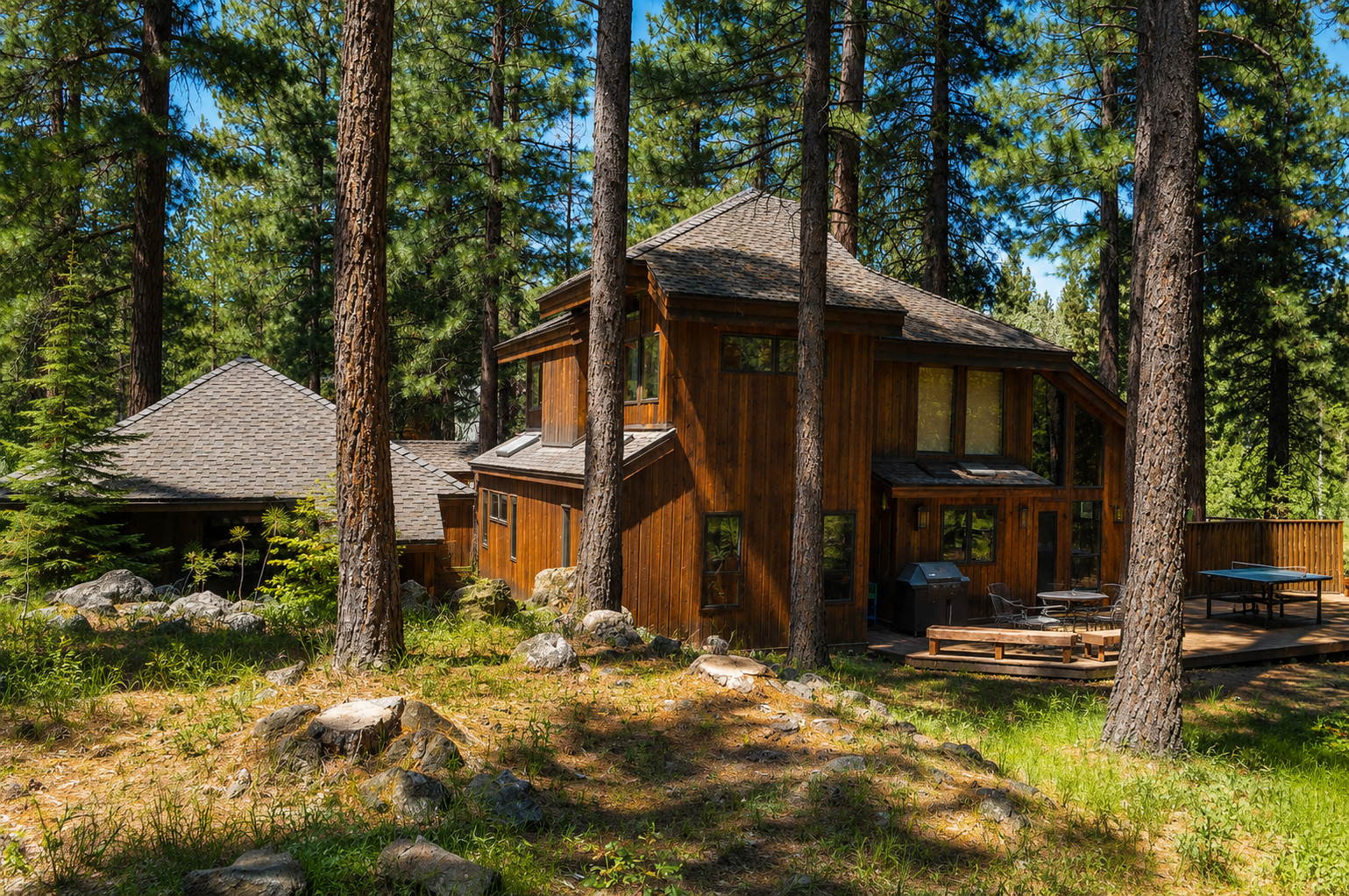 A secluded mountain cabin nestled among towering pines, offering an outdoor deck, BBQ grill, and glimpses of a nearby hot tub for ultimate forest relaxation.