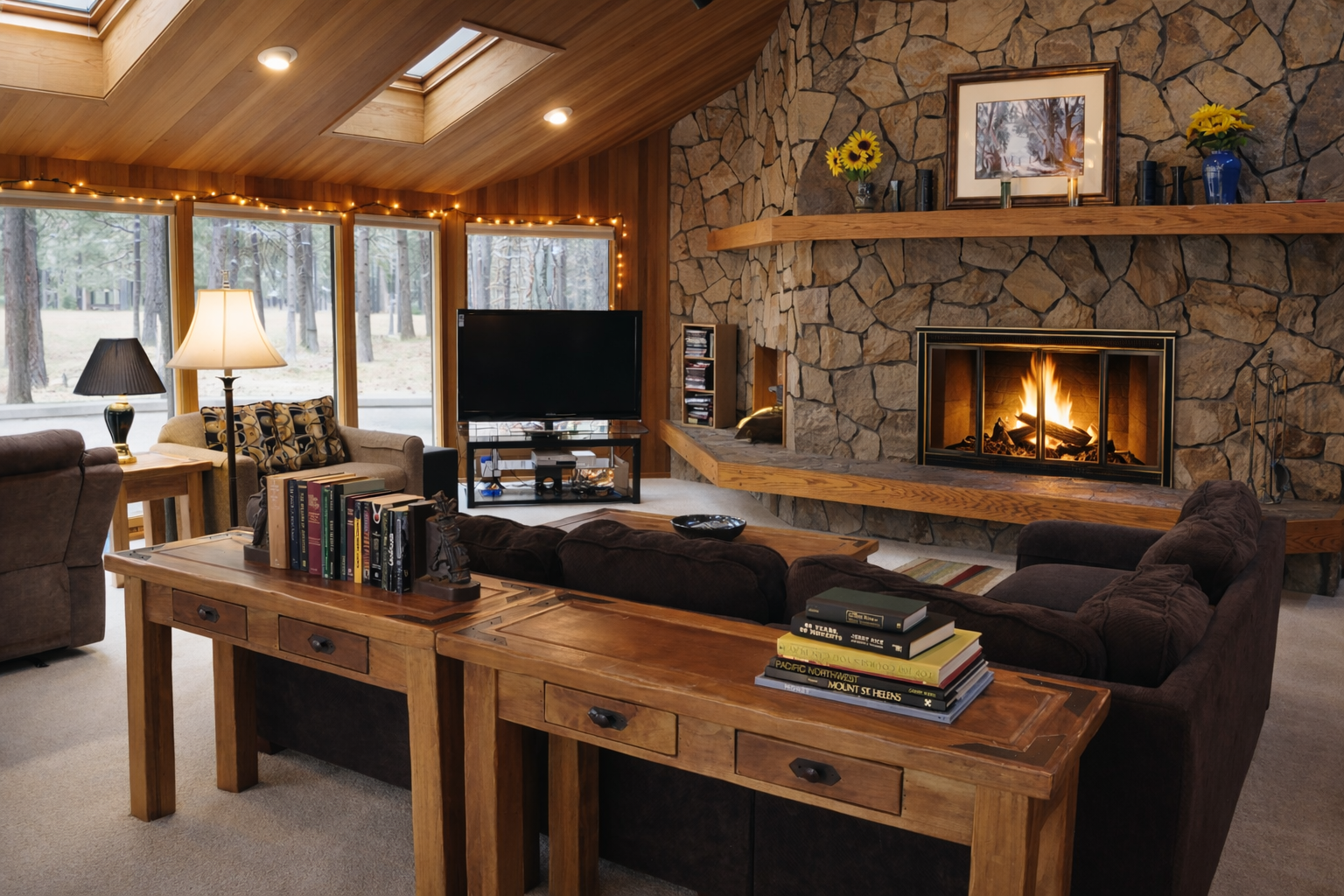 Warm up by your crackling stone fireplace while browsing books from the well-stocked library in this cozy retreat.