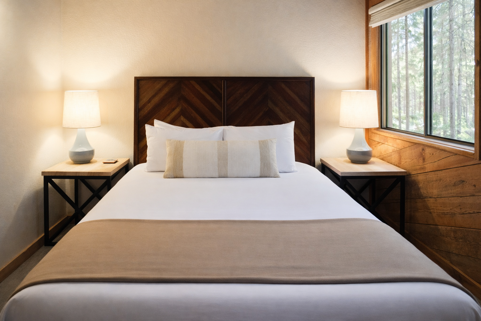 Rest peacefully in your serene bedroom, surrounded by warm wood tones and soft lighting, with forest views to greet you each morning.
