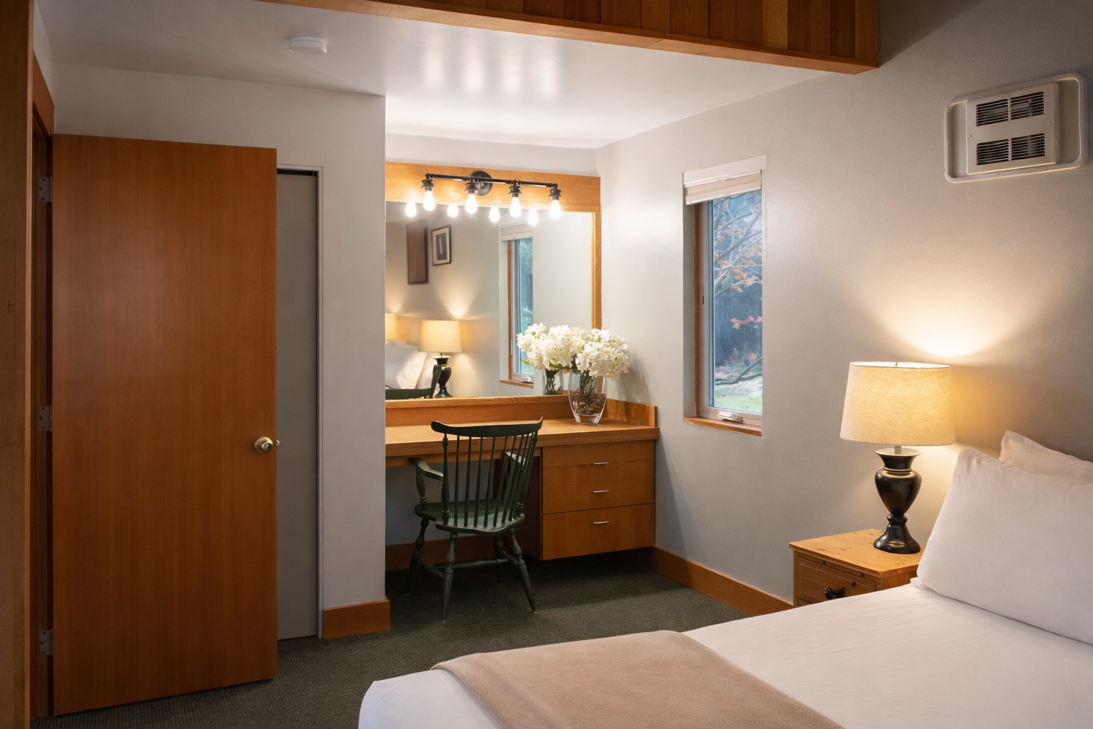 Your cozy bedroom features a built-in desk area where you can catch up on work or journal about your adventures.