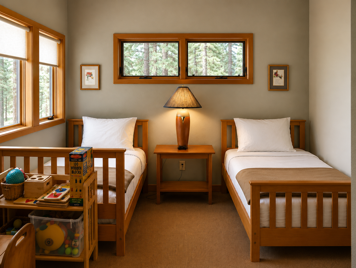 Your cozy bedroom features twin beds with crisp linens, warm wood furnishings, and forest views through the windows—perfect for restful mountain getaways.