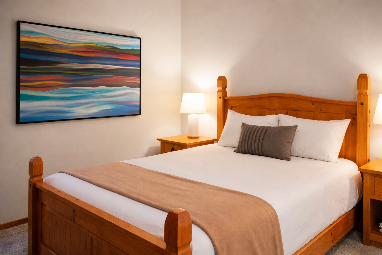 Unwind in your cozy bedroom featuring a comfortable wooden bed with crisp linens and warm lighting for peaceful nights.