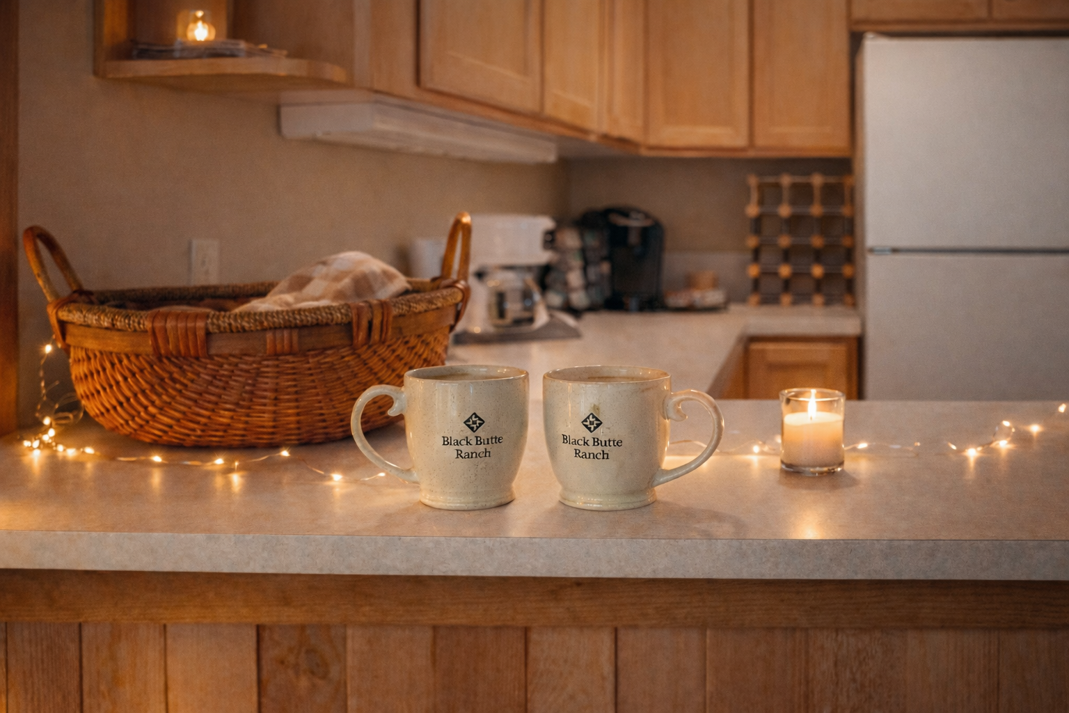 Start your morning with warm coffee from custom mugs in your fully-equipped kitchen, complete with cozy lighting that makes every moment feel special.