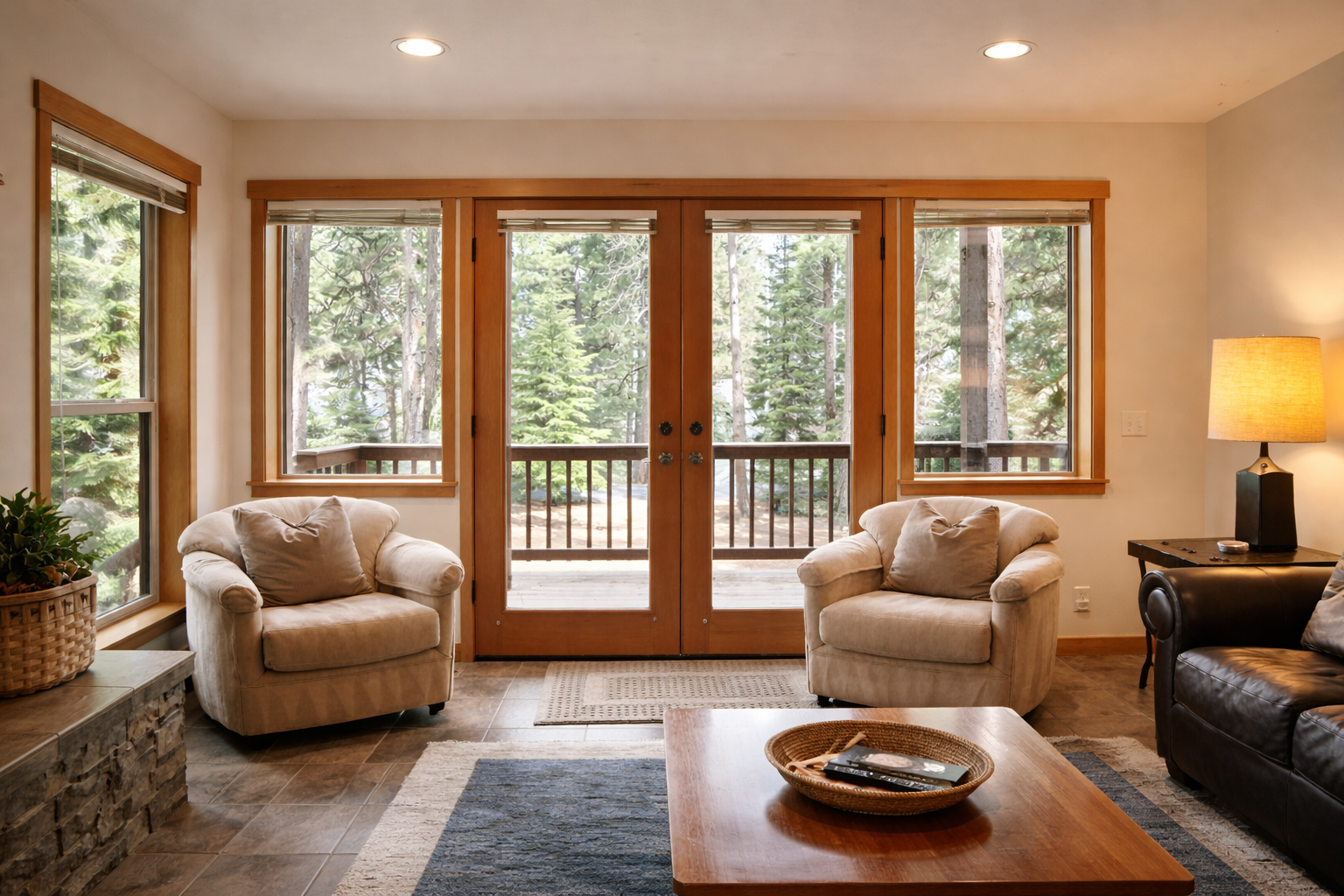 Sink into plush armchairs and let warm lamplight create the perfect evening ambiance while you gaze at towering evergreens through expansive windows.