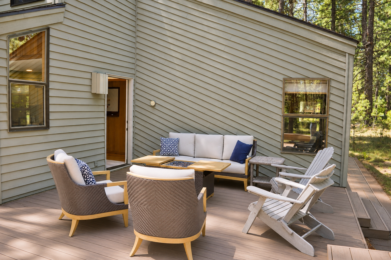 Your private deck invites leisurely mornings and peaceful evenings surrounded by towering pines. Sink into plush seating and let the forest calm your senses.