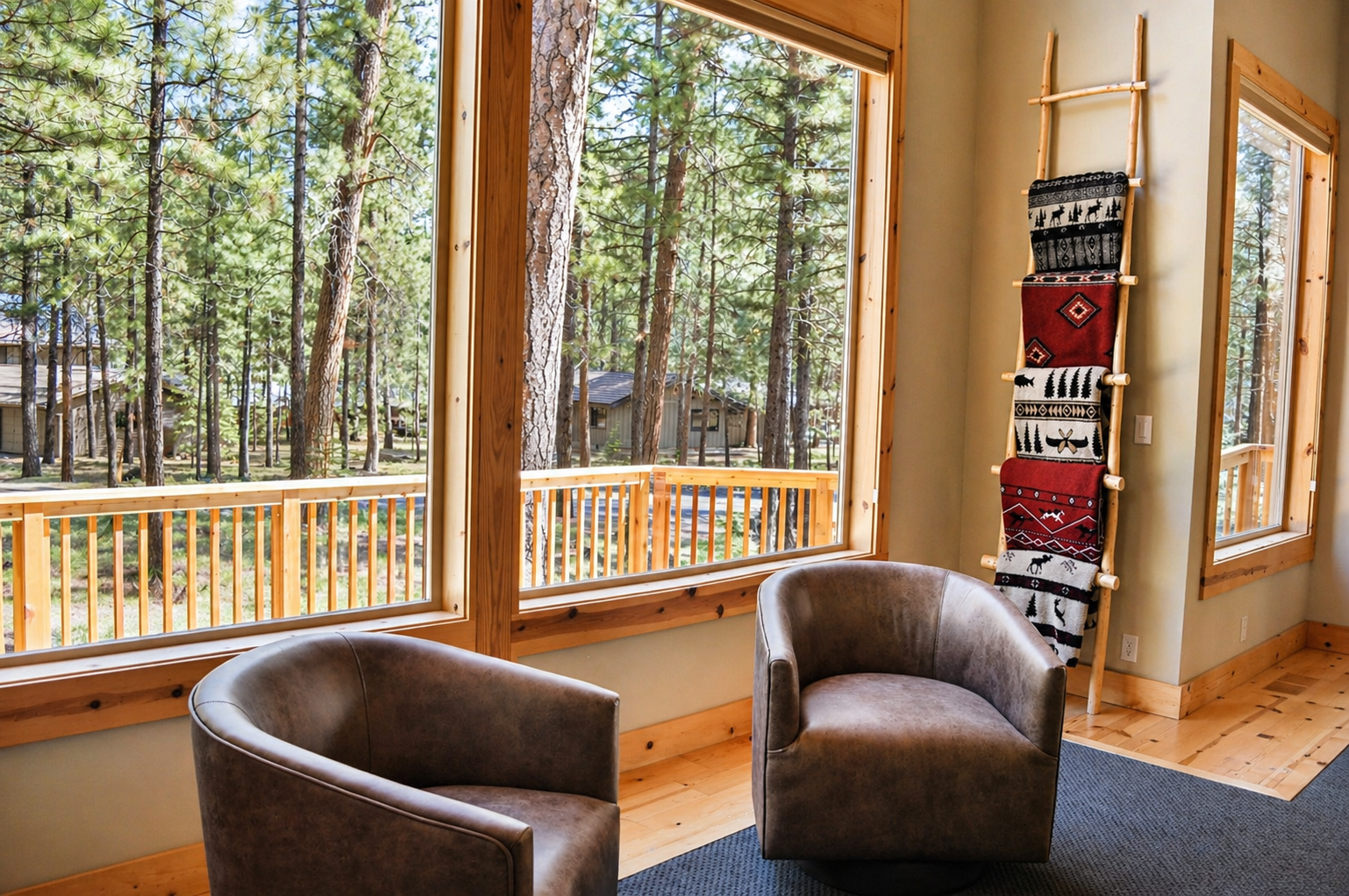 Settle into these cozy leather chairs and let your gaze drift through floor-to-ceiling windows to peaceful forest views.