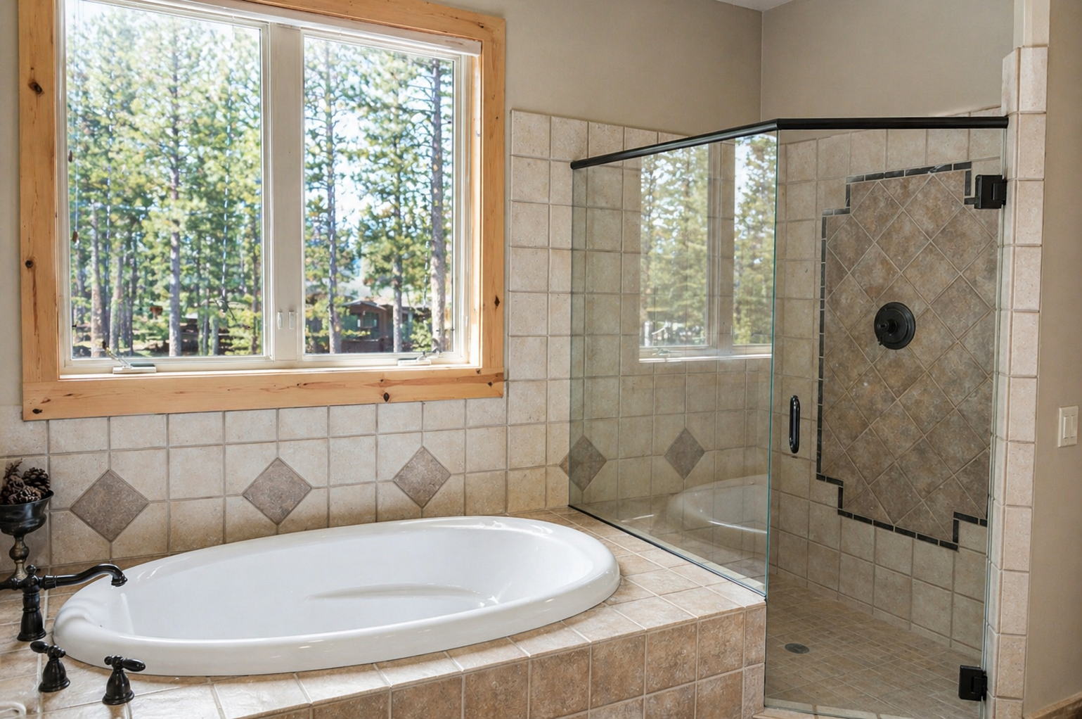 Unwind in your private spa-like bathroom with soaking tub and walk-in shower, framed by forest views.