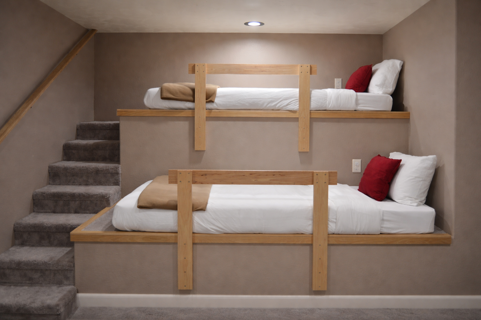 Rest comfortably in these thoughtfully designed built-in bunks with crisp linens and safety rails for peaceful nights.