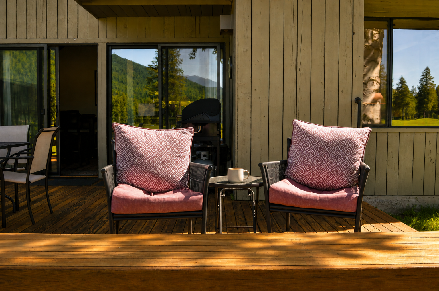 Sink into plush seating on your private deck, where morning coffee comes with mountain views and the forest's gentle whisper. Your peaceful retreat awaits.