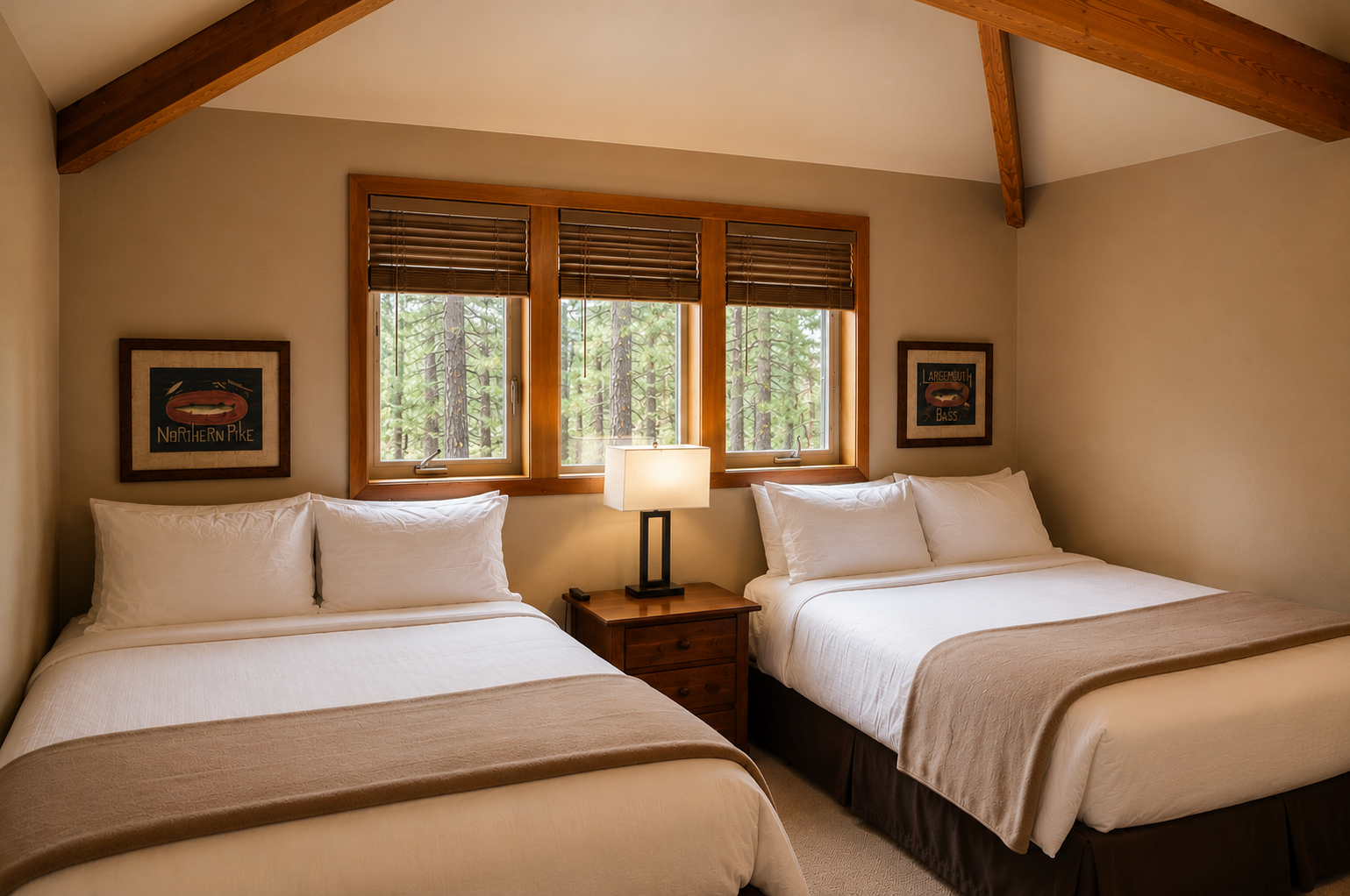 Drift off in comfort under vaulted wood beams, surrounded by peaceful forest views from your window. Two plush beds invite restful sleep in this serene, naturally lit retreat.
