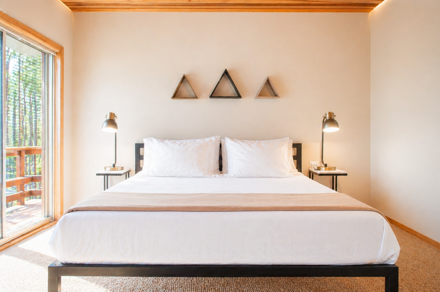 Drift into peaceful sleep in your serene bedroom, where crisp white linens and warm wood accents create the perfect sanctuary for rest.