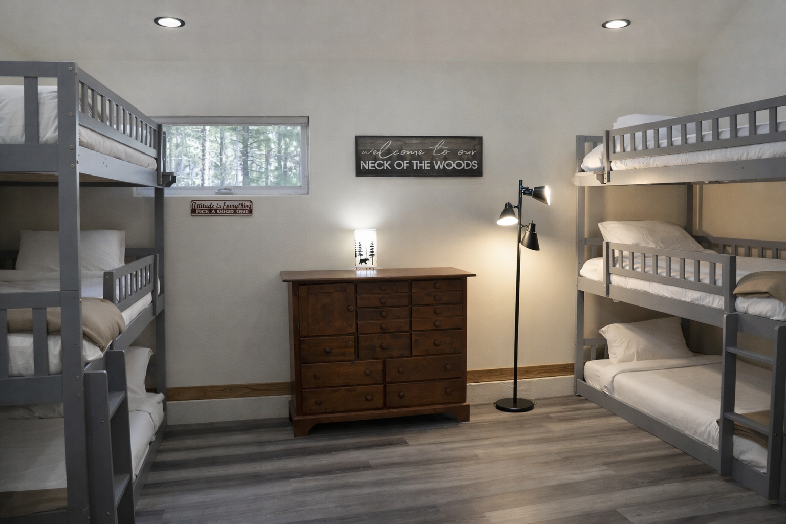 Gather your crew in this charming bunk room where rustic charm meets modern comfort, perfect for creating lasting memories together.