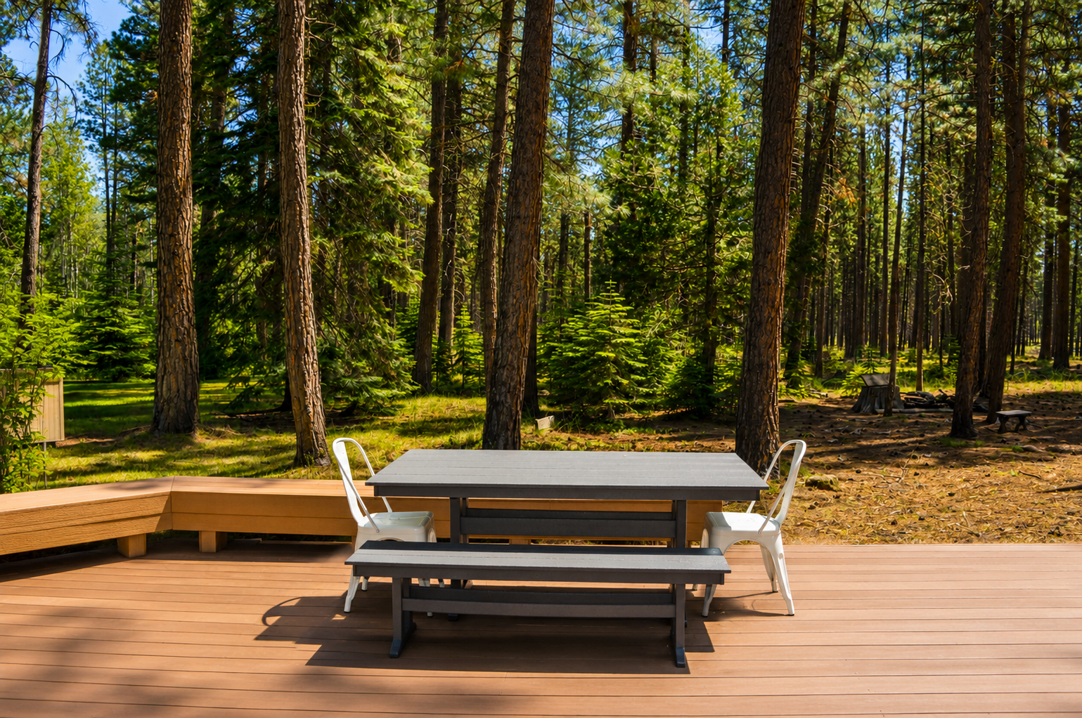 Enjoy morning coffee or evening meals on your private deck, where towering pines and lush forest create a peaceful, nature-filled retreat right at your doorstep.