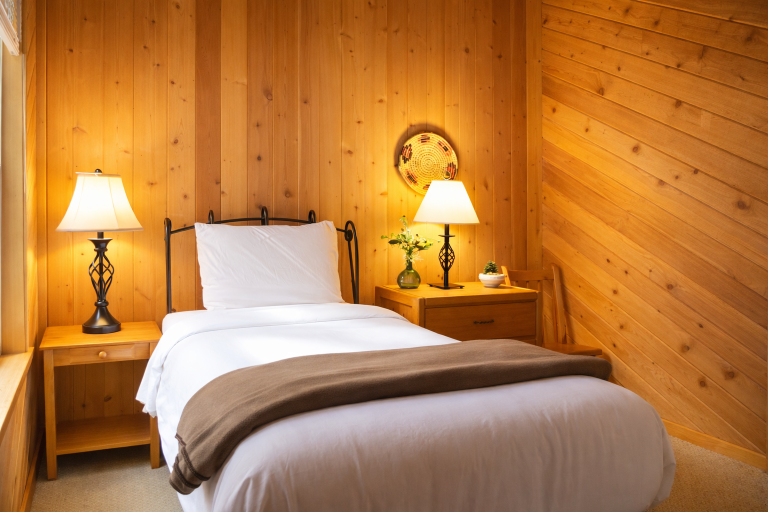 Drift into peaceful sleep surrounded by warm wood walls and cozy lighting in your private mountain retreat.