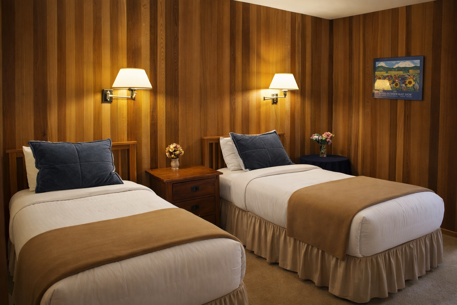 Rest easy in your twin bedroom with warm wood paneling, soft lighting, and comfortable beds for a peaceful night's sleep.