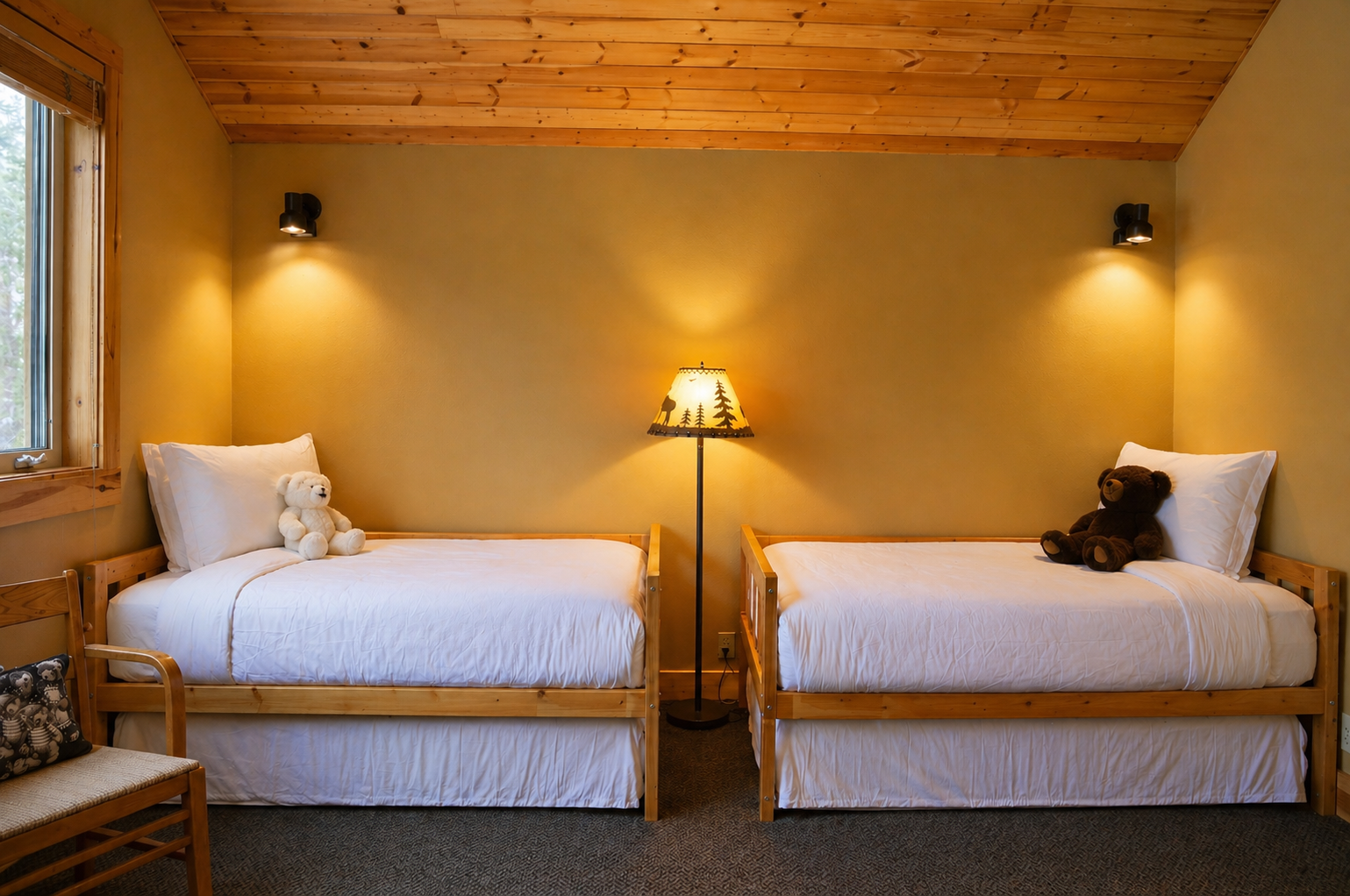 You'll love this cozy twin room with warm wood beams, soft lighting, and adorable teddy bear companions waiting to welcome you home.