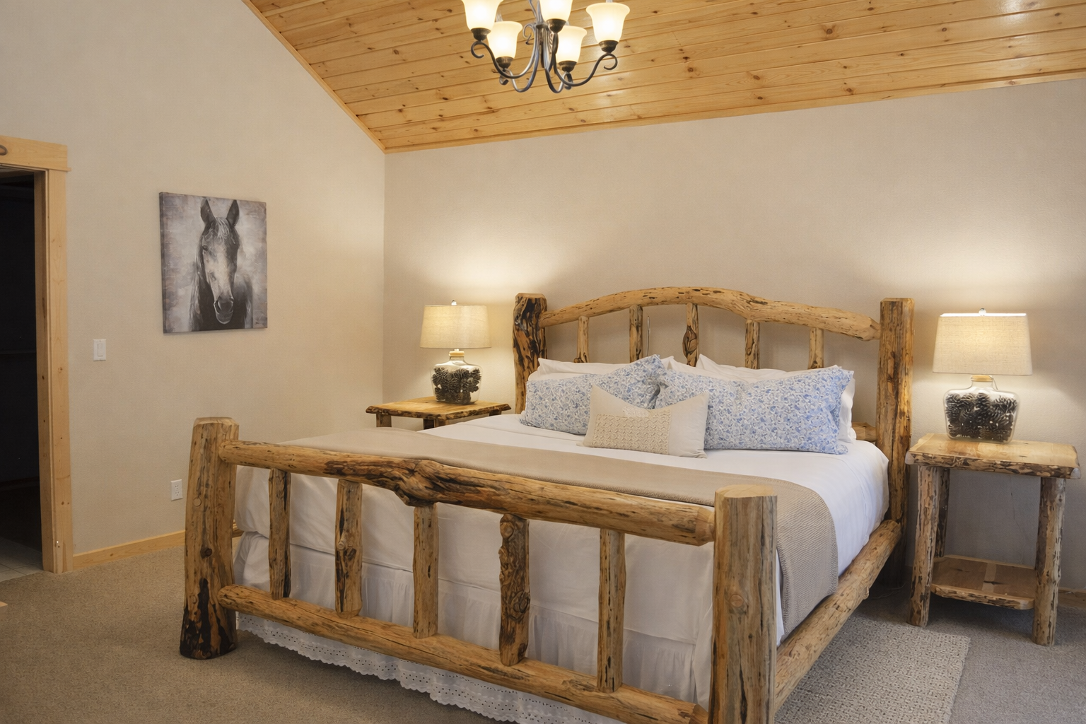 Drift into peaceful sleep surrounded by rustic charm in your cozy bedroom, where handcrafted log furniture meets modern comfort.