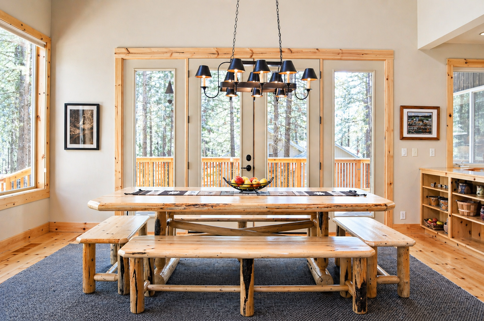 Gather around this rustic dining table where forest views create the perfect backdrop for your memorable meals together.