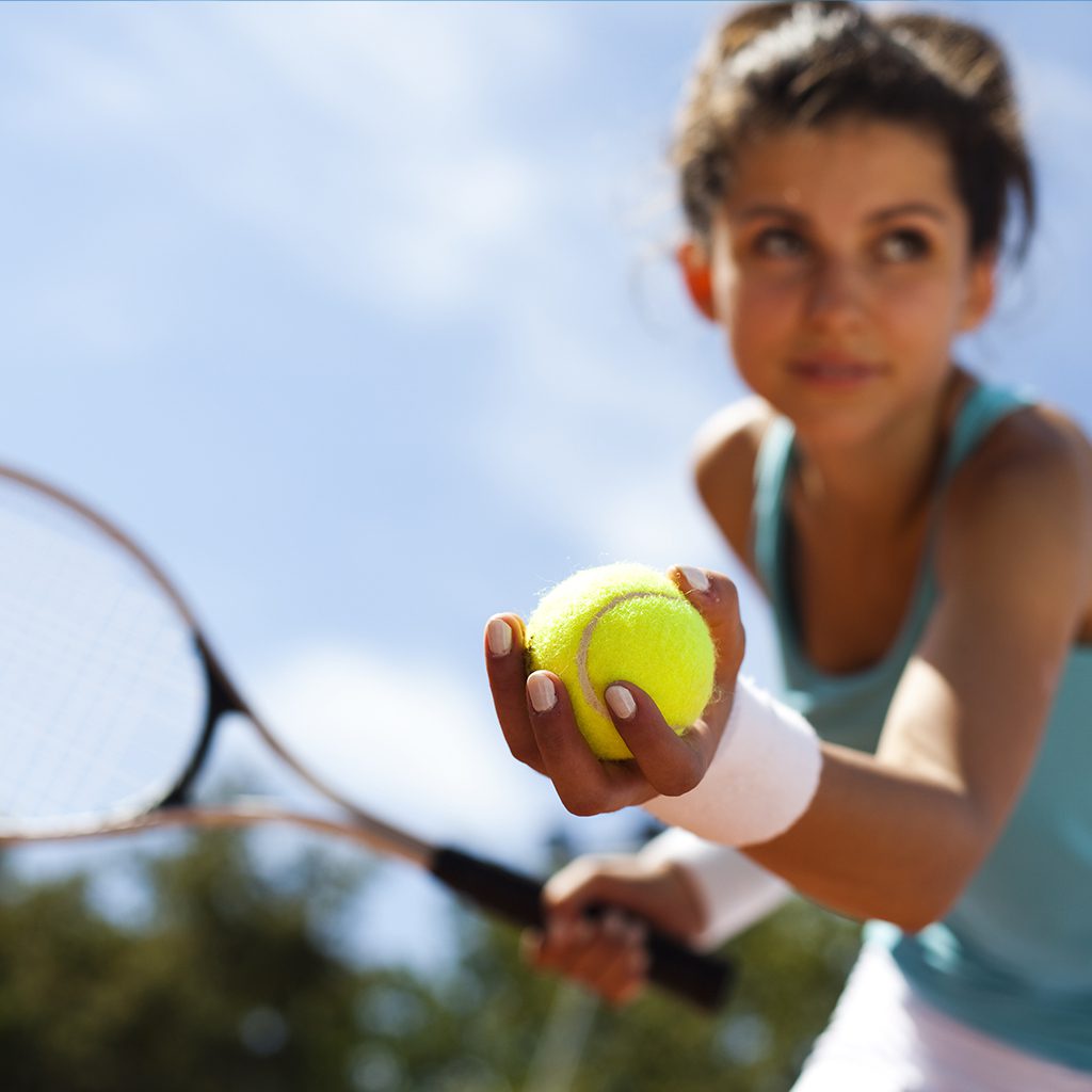 Perfect your serve on our tennis court with clear blue skies overhead and sunshine warming your game.