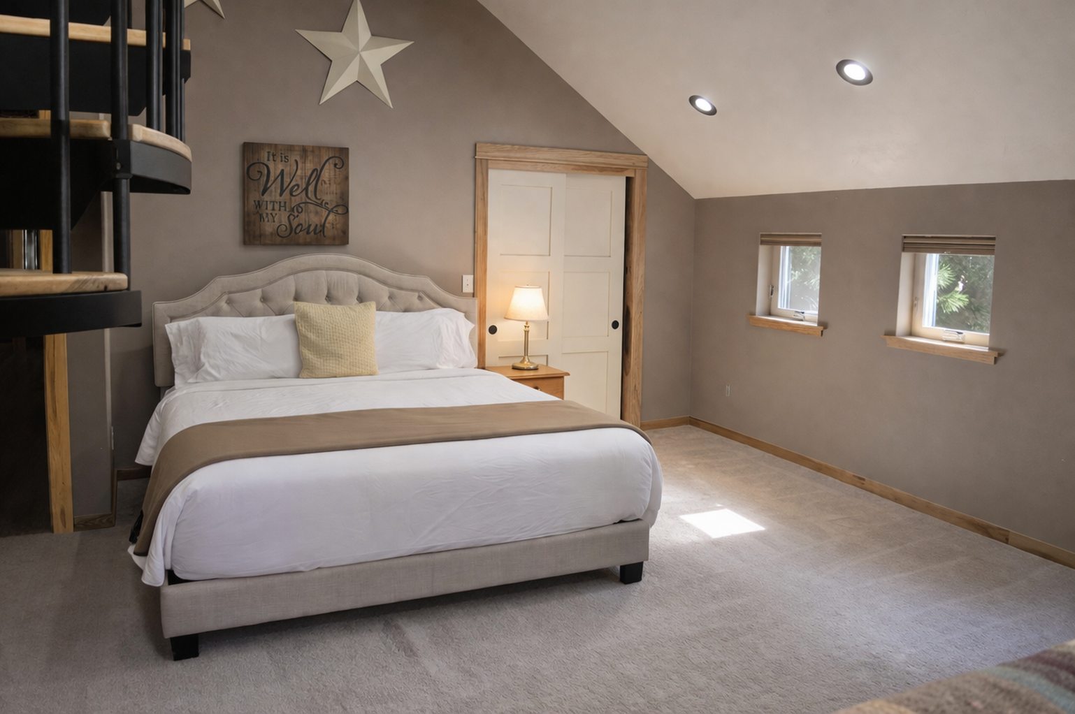 Drift off to sleep in your cozy upstairs retreat, where plush bedding and warm natural light create the perfect sanctuary for rest.