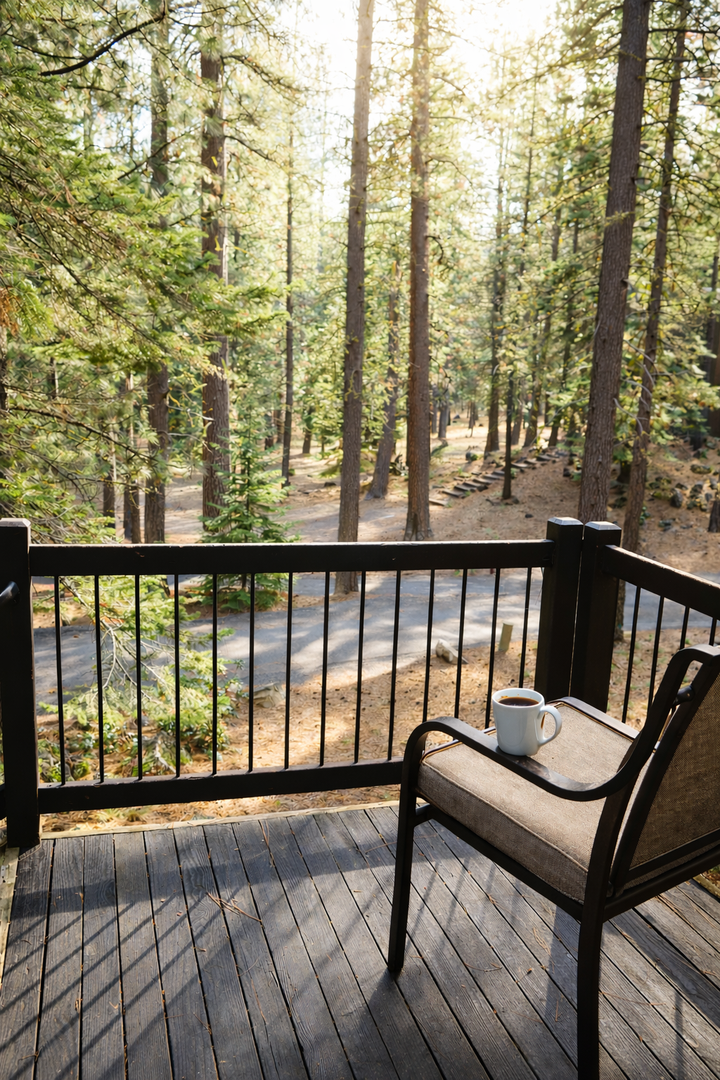 Sip your morning coffee while surrounded by towering forest beauty from your private balcony retreat.