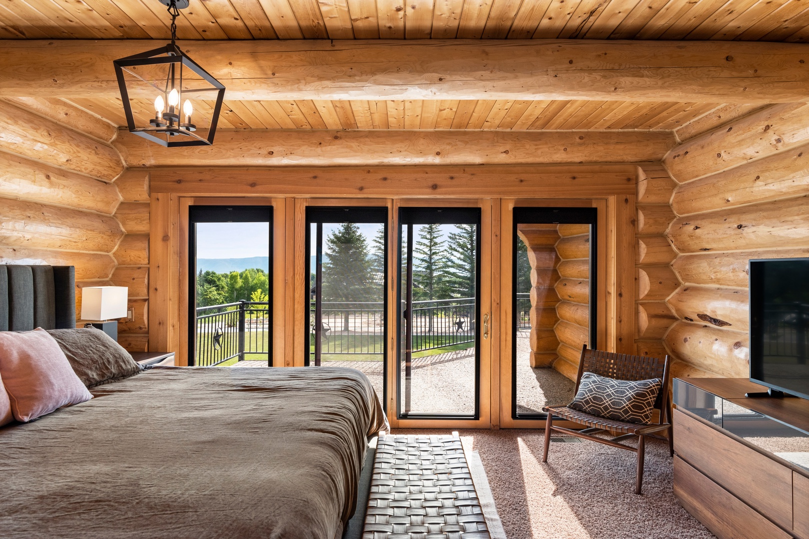 log cabin master bedrooms with fireplaces