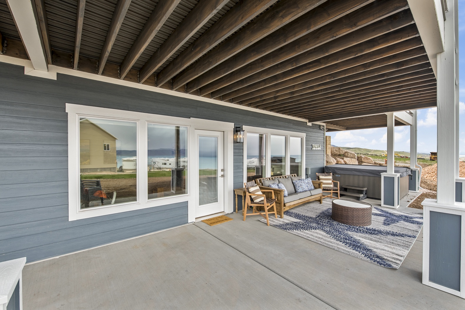 Persimmon HIll-Patio under deck with lounge furniture