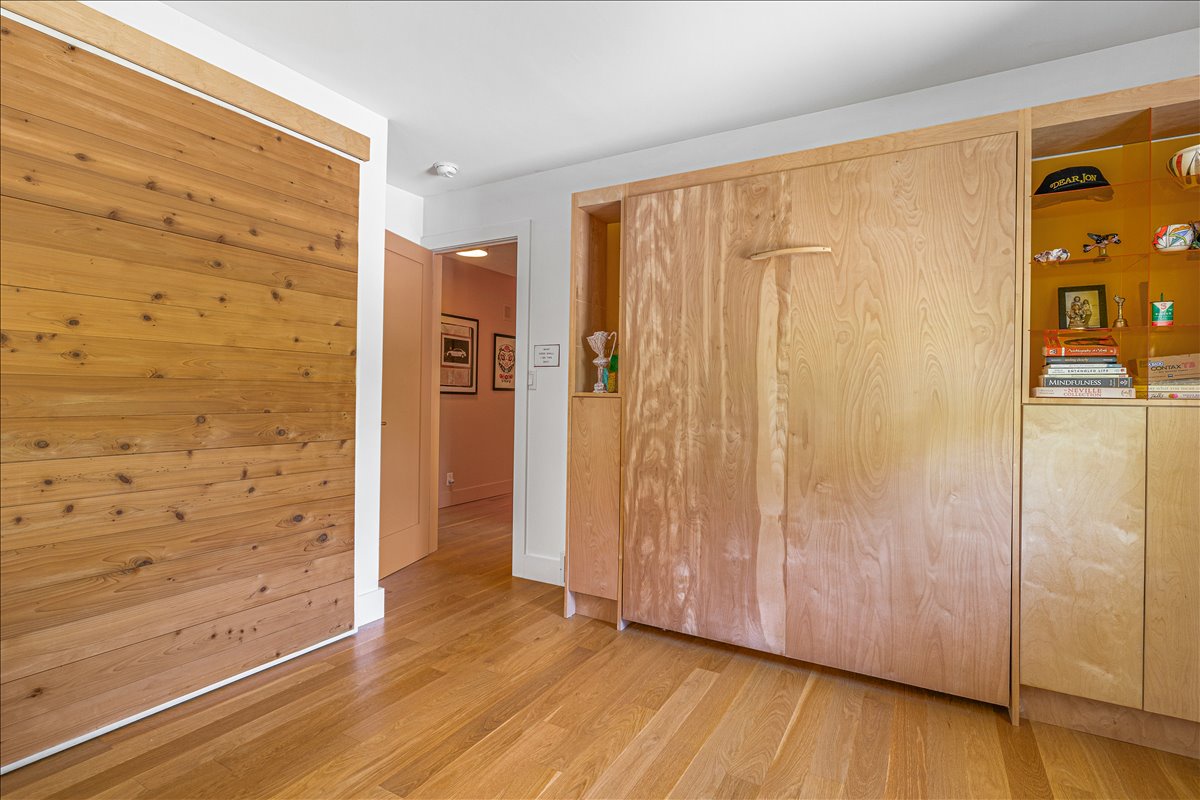 Your cozy retreat features beautiful wood accents and smart storage solutions, creating a warm, organized space for your stay.