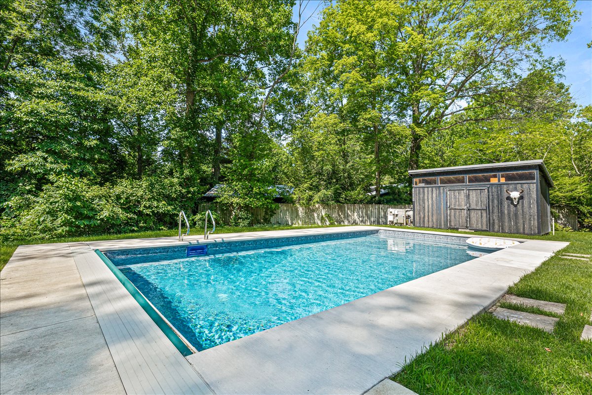 Dive into your private oasis surrounded by lush greenery, where crystal-clear waters await your morning swim or sunset dip.