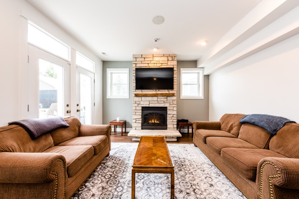 Walkout Basement Seating (TV & Fireplace)