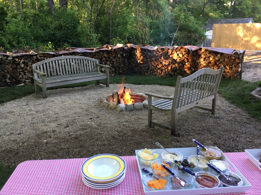 Firepit with lots of wooded provided as well as marshmallow sticks for S'Mores!