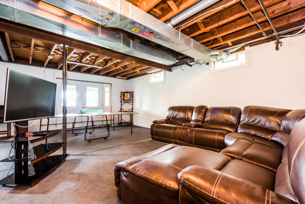 Walkout Basement TV Room & Ping Pong Table