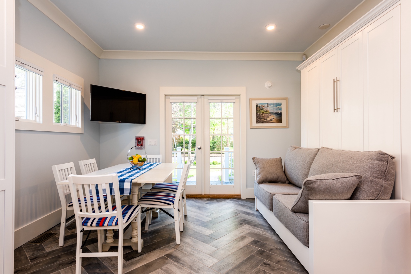 Dining and Living Room Area with Table open up for more seating - Herringbone Suite