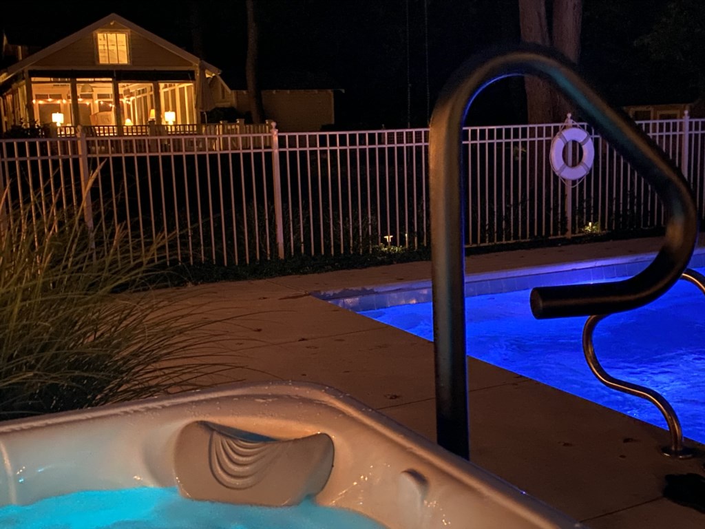 View of screened porch from the hot tub.