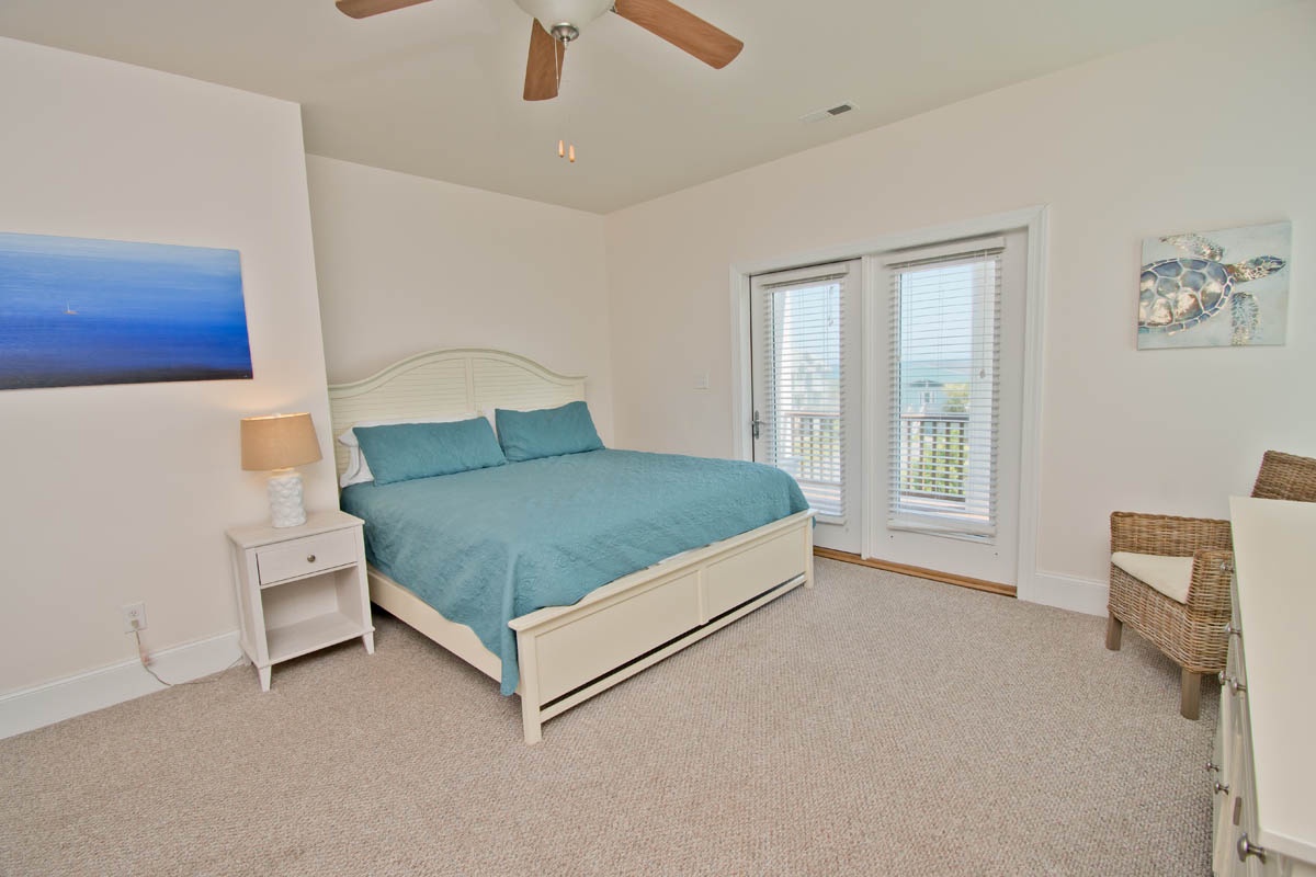 1st Floor Bedroom w/ King Bed, Crib, & Deck Access