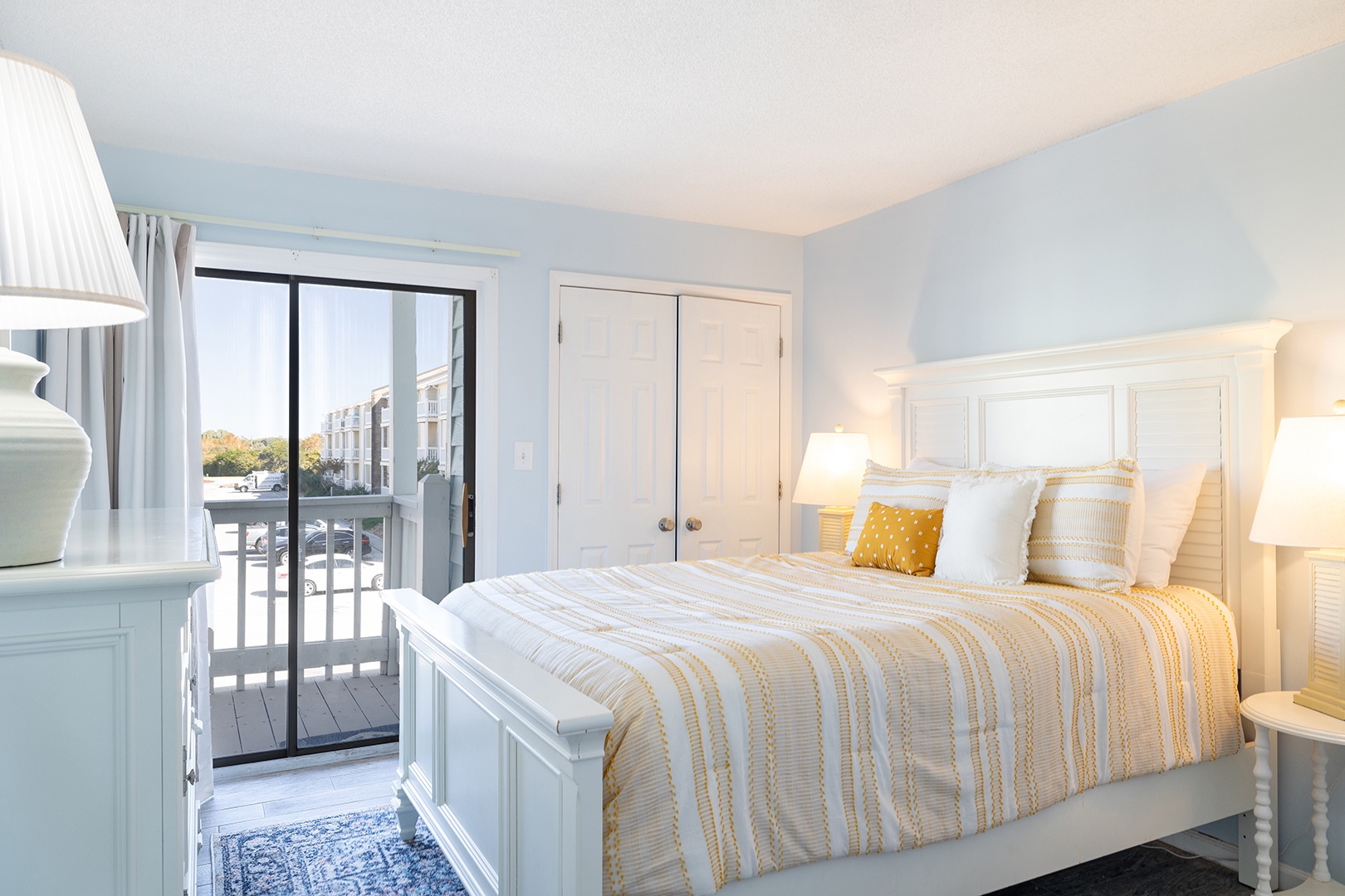Bedroom w/ Queen Bed & Balcony Access
