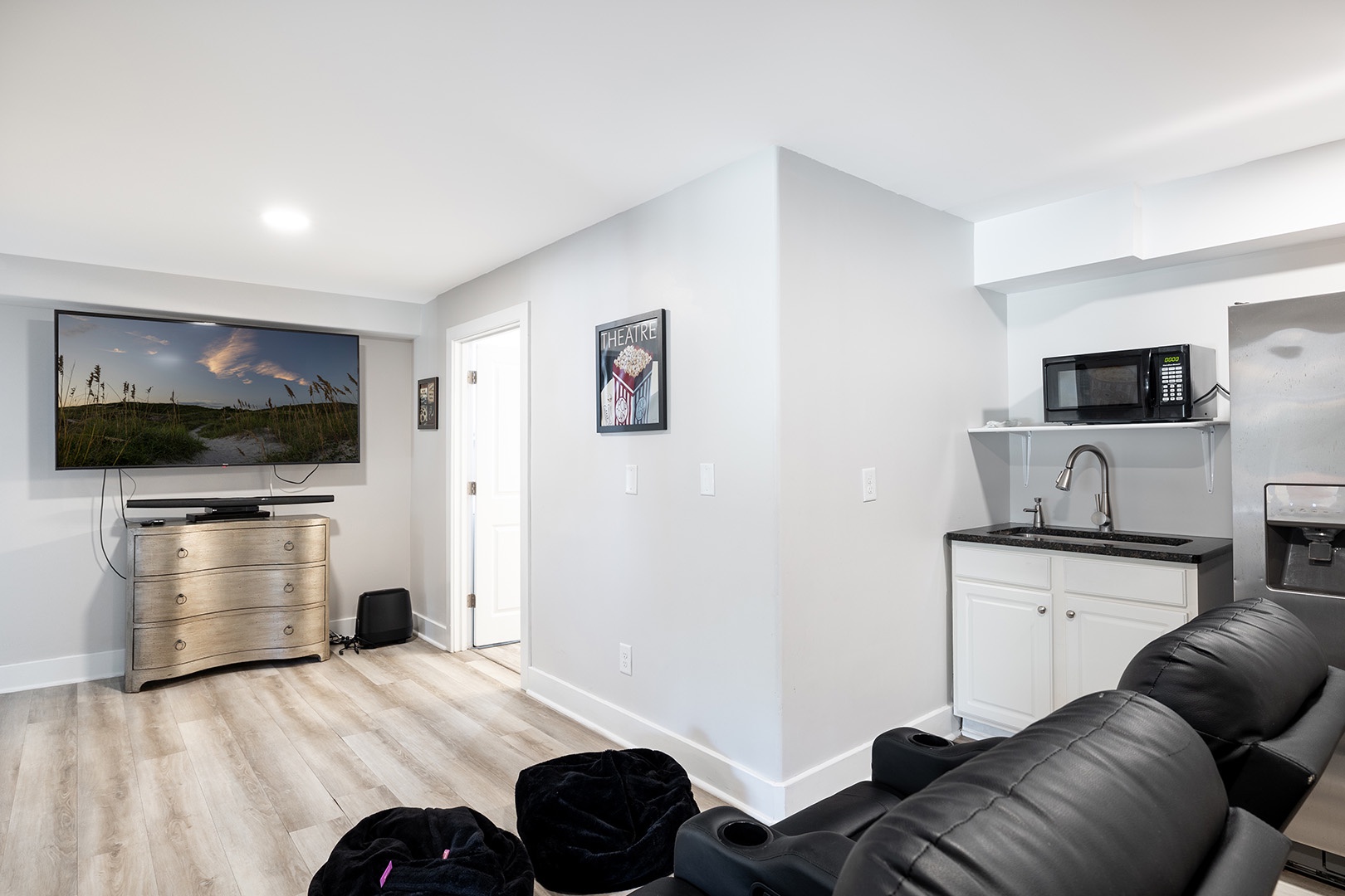 1st level theatre room and laundry