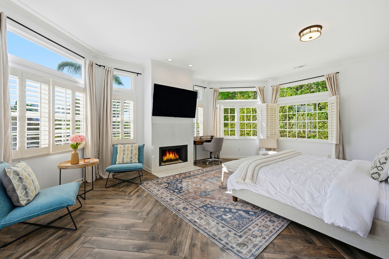 Primary Suite with TV and fireplace