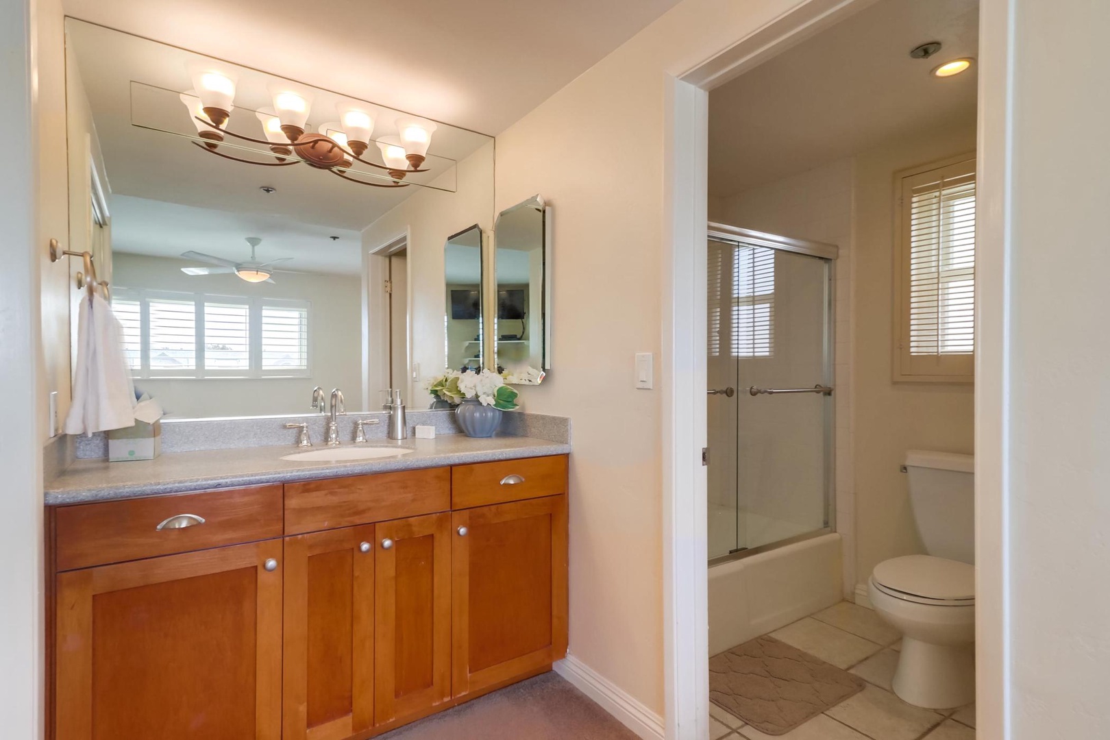 Tub-shower combo in primary bedroom
