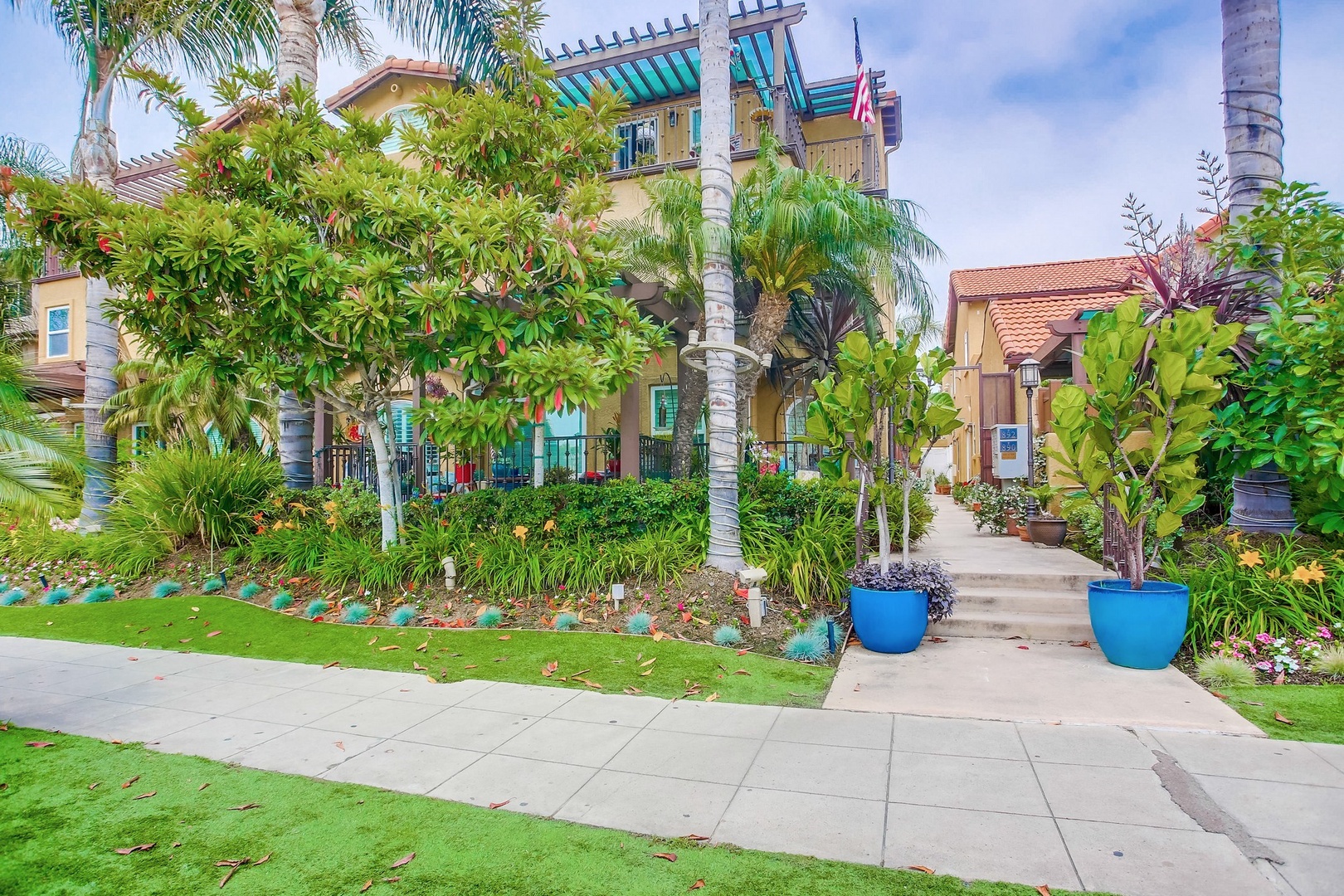 Lush plantings surround the complex