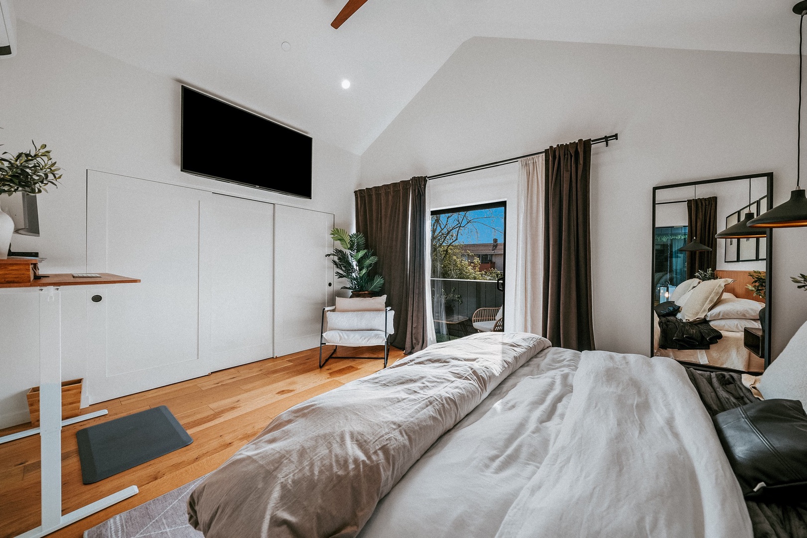 Bedroom 2 with TV and balcony